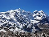 13 19 Mera Peak Central Summit, Mera Peak North Summit, Mera Peak West Summit From Between Khare And Mera La From just off the Mera Glacier, the steep Mera Peak northwest face leads to the Mera Peak Central and North Summits. The Mera Peak Western (6255m) summit is on the far right.